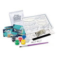 Art supply kit with plaster mould, paint, and tools on a white background