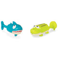A photo of Battat Animal Water Squirts from the brand Battat: a blue and white shark with a red mouth and a green and yellow crocodile with textured bumps on its back and an expressive face. These silly squirts are designed to be friendly, cute, and perfect for children's play.