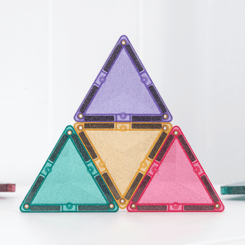 Four triangular colorful objects on a white background