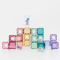 Pastel wooden balls racing through the Connetix ball run