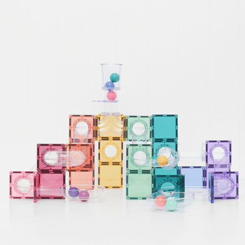 Pastel wooden balls racing through the Connetix ball run
