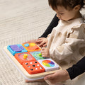 Child playing with Fat Brain PlayTab Essential Set