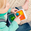 Child playing with Fat Brain PlayTab Go