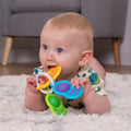 Dimpl Clutch green, yellow and blue sensory toys with dimpl bubbles and textures