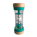 Presenting the HAPE Beaded Raindrops—a clear cylindrical hourglass timer from HAPE, featuring teal and wooden caps on both ends. Inside, white, light blue, and green beads cascade through a white funnel at the center, mimicking soothing raindrop sounds when turned—making it perfect for a toddler's sensory playtime.