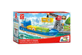 The Hape Cargo Ship & Crane by Hape features a vibrant toy box illustrating a cargo ship and a magnetic crane set. This playset includes a container-loaded ship and an operational crane for unloading, set against the backdrop of a city skyline. The box is labeled with "Cargo Ship & Crane, Frachtschiff und Hafenkran" and is suitable for children aged 3 and up.