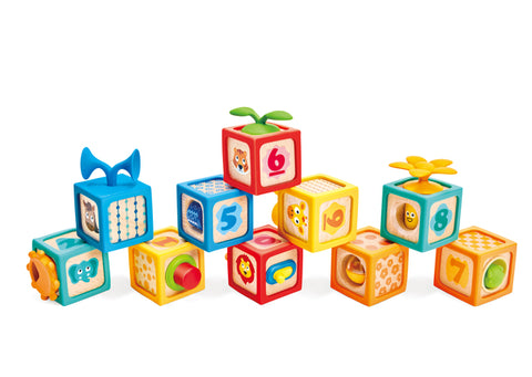 Hape Delightful Discovery Blocks suction cups sticking to a window
