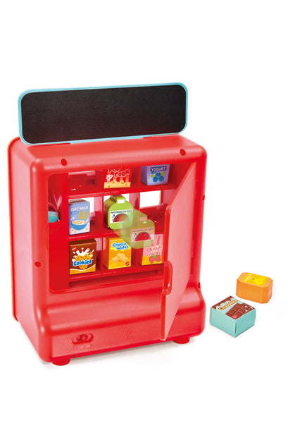 Child playing with the Hape Fantastic Vending Machine