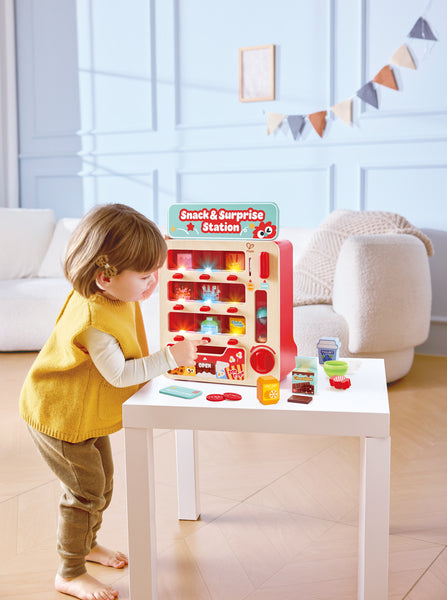 Hape Fantastic Vending Machine dispensing a snack