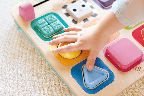 Hape Grow-With-Me Push Walker as an activity centre