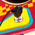 Close-up of a joystick on a colorful game console