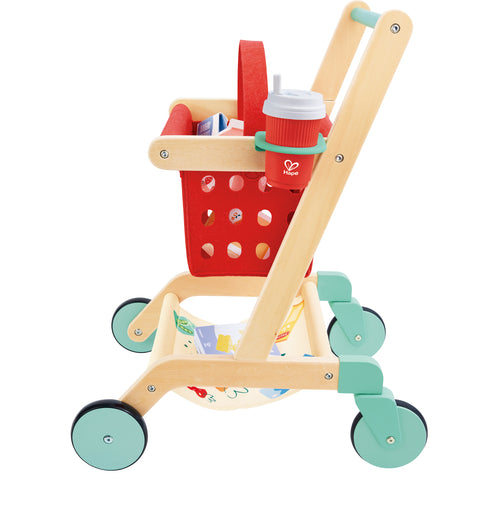 Hape Little Shopper's Cart & Basket with a red basket and green wheels on a white background