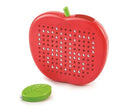The Hape Magnetic Drawing Board from hape is a vibrant red, apple-shaped pegboard toy featuring round holes in a grid pattern. It displays the word "BIG" using inserted pegs. A green, magnetic leaf pen, which serves as the stylus or peg handle, is conveniently placed next to the board. This playful tool is perfect for creating pictures and igniting creativity.