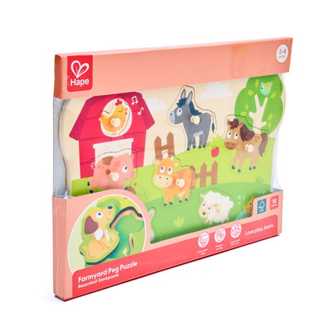 Hape Farm Animals Peg Puzzle with the wooden animal pieces placed into their matching spaces on the board.