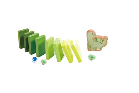 Row of wooden domino pieces beside a purple dinosaur figure and coloured marbles
