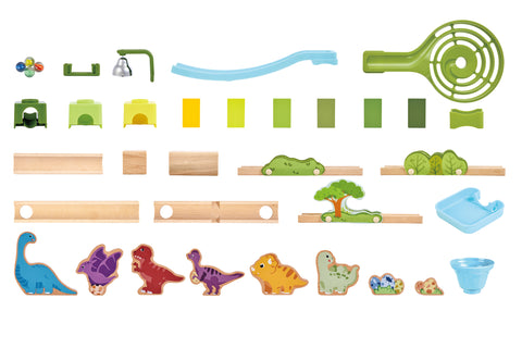 Flat lay of all 131 Hape Dino Adventure Run pieces including marbles, connector blocks, rails, a spiral funnel, a bell, a slide, dinosaur figures and fossil pieces