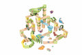 Fully assembled Hape Dino Adventure Run wooden marble run with spiral tower, dinosaur figures, trees and coloured marbles