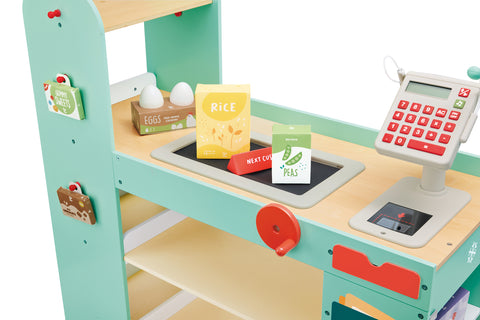 Hape Smart Play Shop with various items on a wooden play kitchen counter