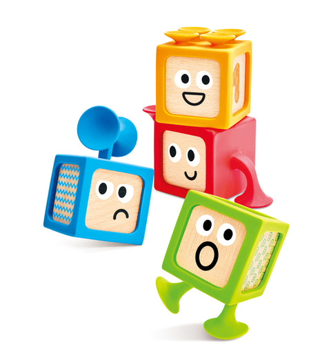 Hape Suction & Sensory Blocks stuck to a window