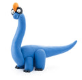 A blue, cartoonish Brachiosaurus figurine from the Hey Clay 6 pack - Dinos collection, made from modeling clay with a long neck, small black eyes, an orange crest on its head, and a playful expression stands on a white background. This adorable creation is part of the Hey Clay Play-Set designed for sensory development.