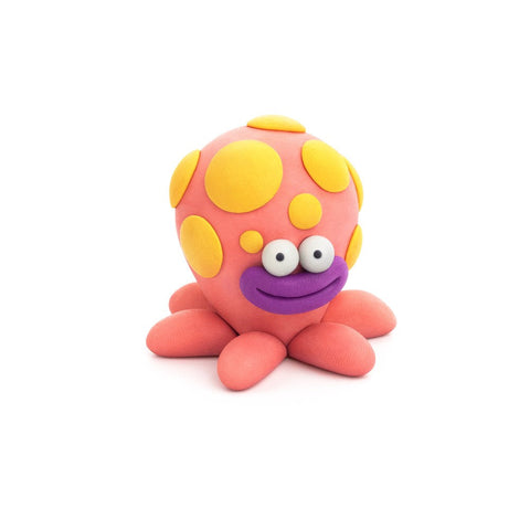 The Hey Clay Single Pack - Octopus by Hey Clay features a charming, cartoonish octopus crafted from smooth, vibrant clay. This orange octopus, adorned with large yellow spots, sports big googly eyes and a cheerful purple mouth. With its tentacles splayed on a white background, it presents an expressive and playful look that is ideal for play-based learning.