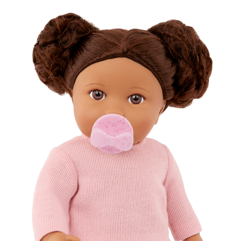 Lullababy 14" doll with brown hair styled in buns, wearing a pink sweater on a white background