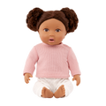 Lullababy 14" doll with brown hair styled in buns, wearing a pink sweater and white pants on a white background