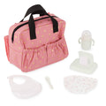 Lullababy Pink diaper bag with black handles and star pattern, surrounded by baby items on a white background.