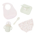 Lullababy baby care product set including a bib, bottle, spoon, and hat on a white background
