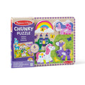 Melissa & Doug Unicorn Chunky Puzzle packaging box beside the puzzle board, showing the 6 pieces callout and the pink, white and purple unicorn pieces in place