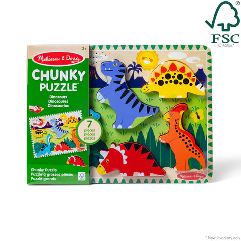 Melissa & Doug Chunky Dinosaur Puzzle packaging box beside the puzzle board with T-Rex, Stegosaurus, Triceratops and a crested dinosaur pieces in place