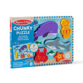Melissa & Doug Sea Life Chunky Puzzle packaging box showing the 7 pieces callout, beside the assembled puzzle board