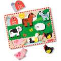 Melissa & Doug Chunky Farm Puzzle board with barn, horse, goat, cow, sheep, pig, ducks and hen-and-chick pieces in place, with the pig and hen pieces lifted out beside it