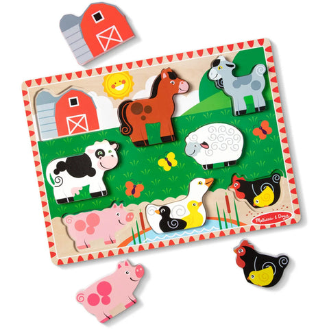 Melissa & Doug Chunky Farm Puzzle board with barn, horse, goat, cow, sheep, pig, ducks and hen-and-chick pieces in place, with the pig and hen pieces lifted out beside it