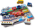 Melissa & Doug Chunky Vehicles Puzzle with several pieces lifted out, including the aeroplane, school bus, police car and train engine, resting beside the board