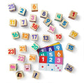 Colorful wooden blocks with numbers and simple illustrations on a white background