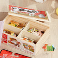 Open Melissa & Doug Farm Puzzles wooden storage box showing the four puzzle compartments with pieces sorted inside, and the slide-on lid used as a puzzle board
