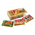 Melissa & Doug Farm Puzzles in a Box with the wooden case and the horse, pig and cow puzzles laid out beside it