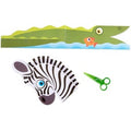 The arts and crafts scene features a paper cutout of a green crocodile with a fish in its mouth and a zebra head beside it, crafted using the Melissa & Doug Safari Scissor Skills activity pad. A pair of green safety scissors from Melissa & Doug, essential for promoting fine motor skills during paper cutting projects, lies nearby.