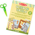 An activity pad labeled "Melissa & Doug Safari Scissor Skills" is shown. The safari-themed activity pad features illustrations of various animals. A pair of green plastic scissors is positioned to the left of the pad, which includes 20 pages of paper cutting projects suitable for ages 4+, perfect for fine motor skills development by Melissa & Doug.