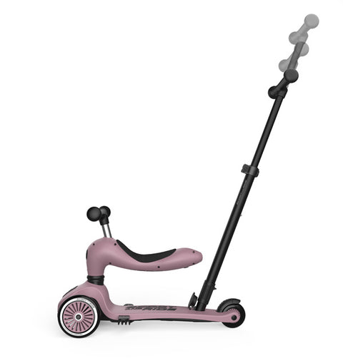 Side view of the Scoot & Ride Highwaykick 1 Push & Go in Wildberry, showing the height-adjustable parent push bar