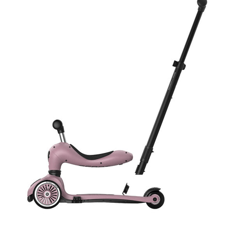 Close-up side view of the push bar attachment point on the Scoot & Ride Highwaykick 1 Push & Go in Wildberry