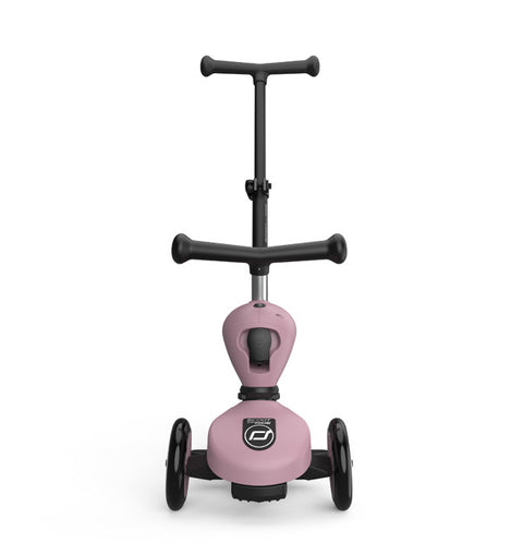 Front view of the Scoot & Ride Highwaykick 1 Push & Go in Wildberry, showing the three-wheel base and handlebar