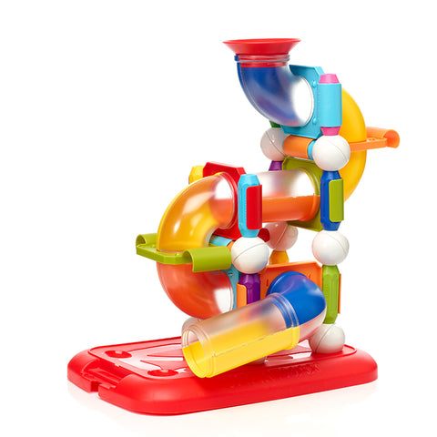 Colorful marble run toy with multiple curved pipes and a red base on a white background