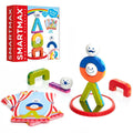 The SmartMax My First Acrobats box, smiling ball magnets, U-shaped and circular parts, and illustrated cards for creating various structures.