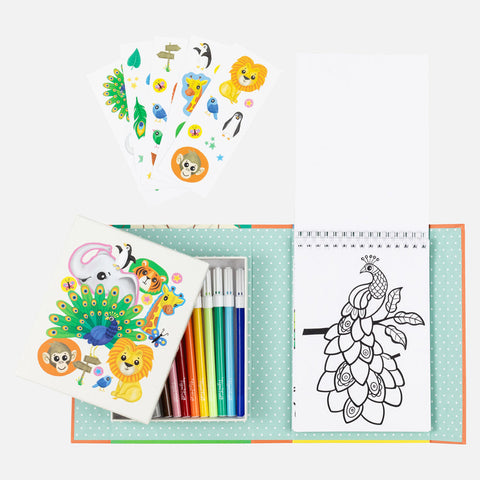 The Tiger Tribe Colouring Set - Zoo by TIGER TRIBE includes vibrant markers, sheets of zoo-themed stickers, and a spiral-bound drawing pad showcasing a peacock illustration. These items are neatly arranged on a polka-dotted surface, making it perfect for kids' creative play.
