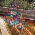 Tall pastel TileTek magnetic tile castle with multiple triangular spires