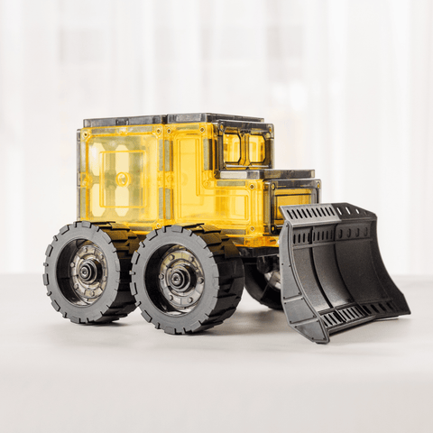 Side view of the assembled magnetic tile bulldozer showing the cab and front blade
