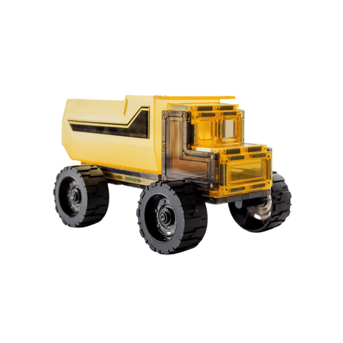 Assembled magnetic tile dump truck with a yellow tipping bed and oversized wheels