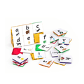 Tile Tek lower-case letter toppers scattered around a small magnetic tile build